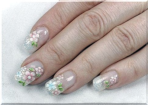 Acrylic nails painted with flowers